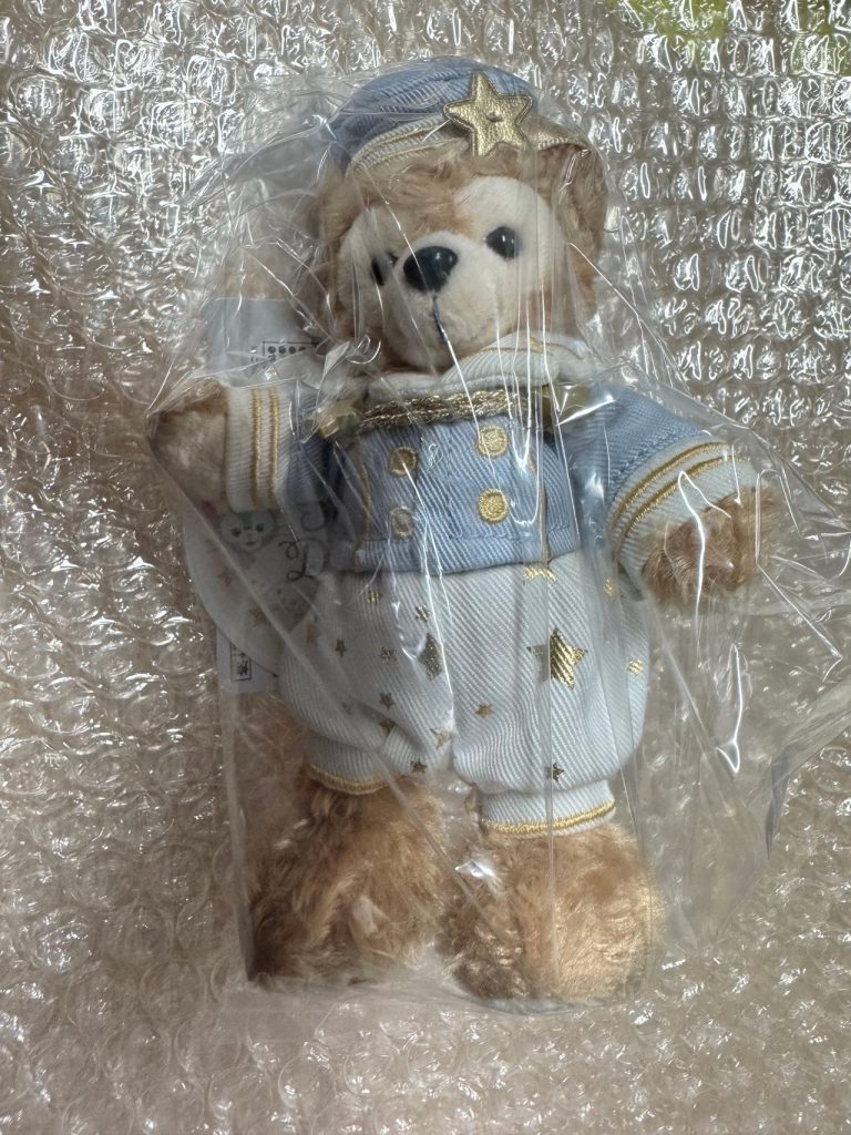 日本代购迪士尼Duffy星空限定版玩偶,穿着蓝金色星星服装,质感细腻。