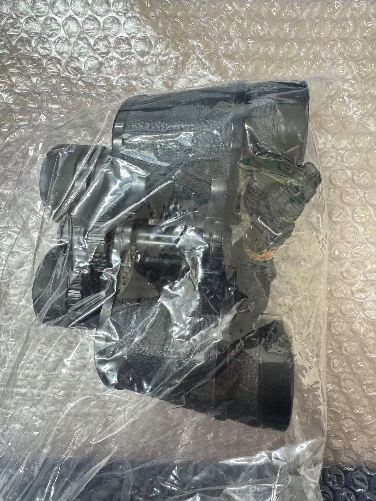 黑色望远镜密封包装状态展示，日本代购到手实拍