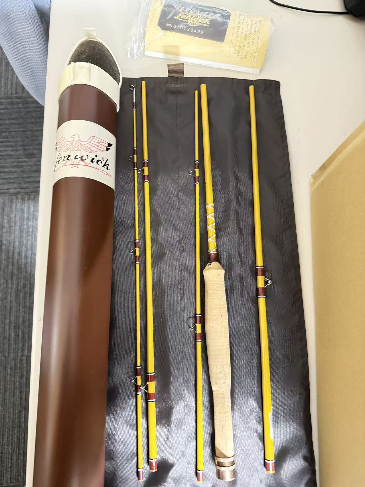 日本代购代拍日系鱼竿开箱实拍,多节振出式鱼竿与原厂竿筒展示